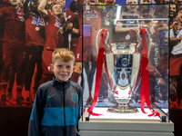 W Academy Players with the Champions League Trophy